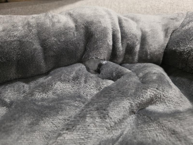 Look how big and easily accessible it is for pups to dig at that hidden hole and consume the internal materials!! Bad quality control! :(