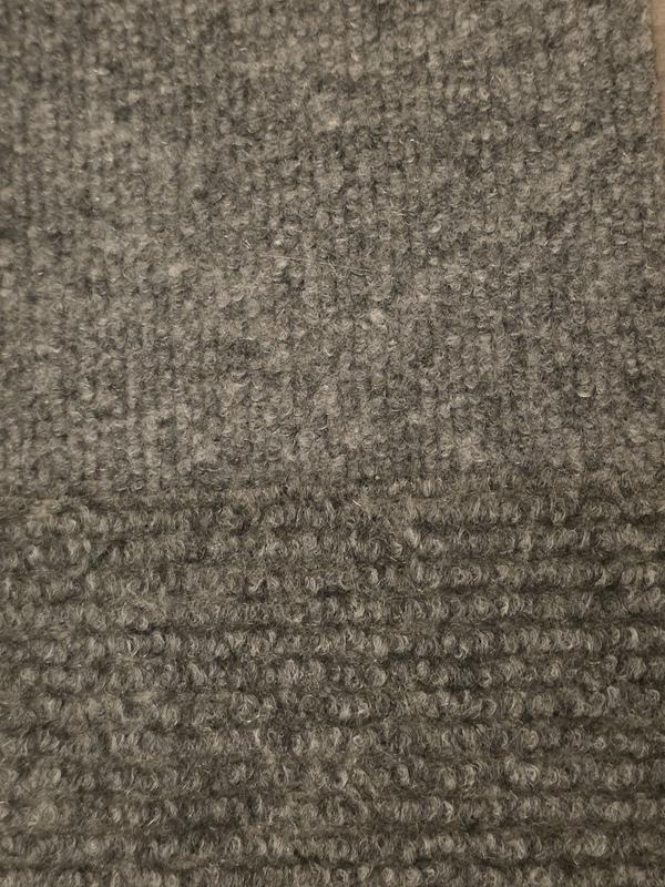 The same mat, side by side, ordered a year apart