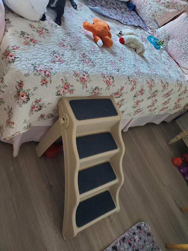 High enough for a bed and  does not take up a lot of floor space.