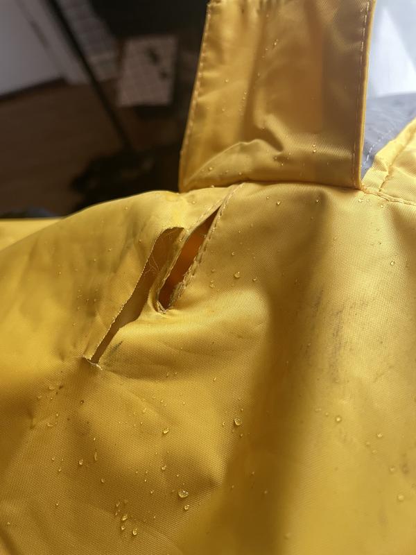 Where the material ripped.