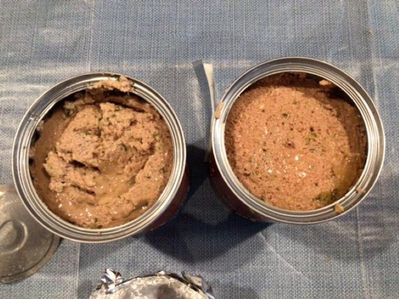 It's hard to tell from the lighting but the can on the left is a lighter color and doesn't look at all like the food we used to get.