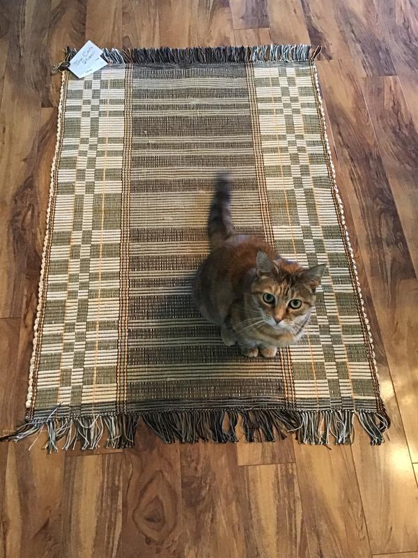 Lovie always sits on my newly woven rug when I photo it.