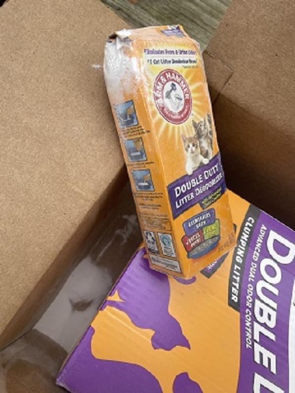 Packing baking soda with a 40lb box of litter=disaster