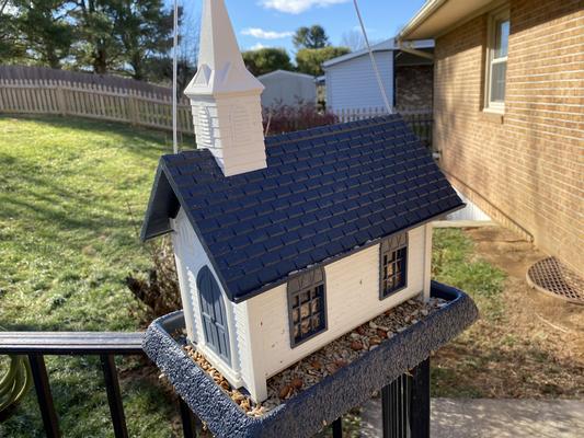 I put this bird feeder on a table instead of hanging it. Works just as great