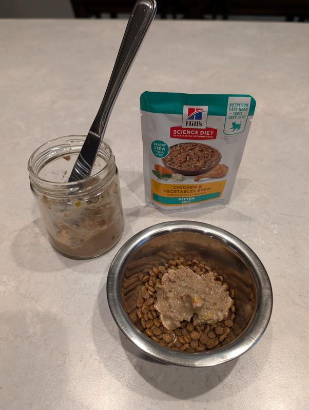 I transfer from the pouch to a glass jar for storage. Less messy!