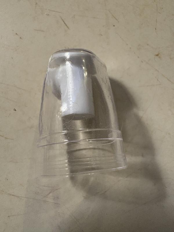 Plastic cap melted into the nozzle