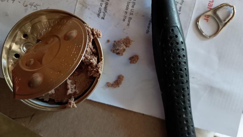 Took me at least a dozen whacks of the hammer on the screwdriver chisel to get into the can. Not the first time.