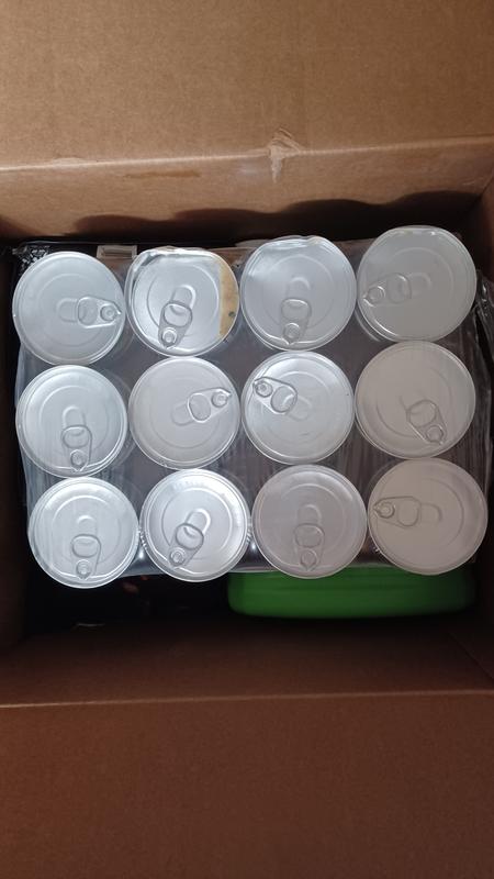 No packing materials and 2 cans are damaged one is open and leaking