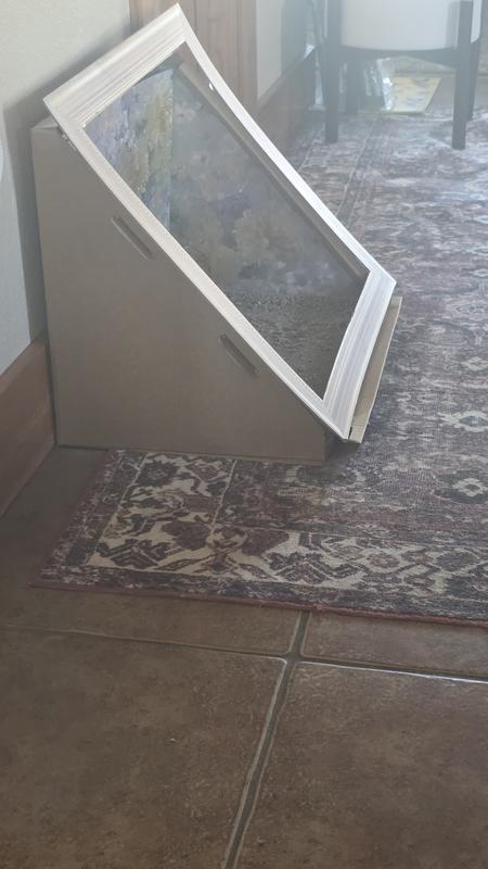 Frame pops off, tabs uncurl