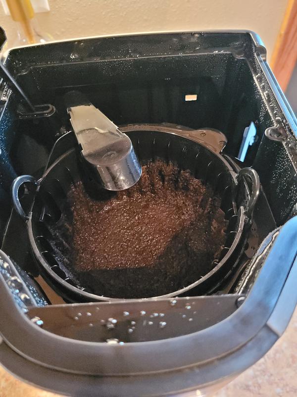 Coffee grounds overflowing. This is with 3 small scoops of grounds