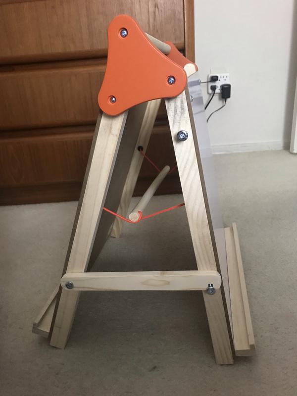 Middle where you hang the paper roll