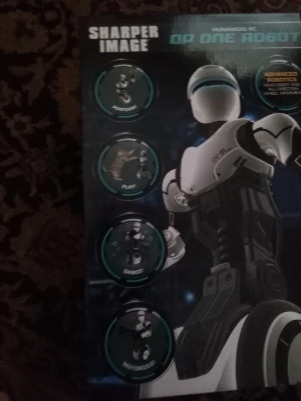 Sharper image rc humanoid op one robot deals