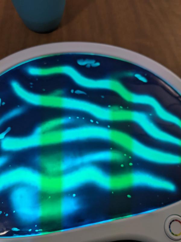 Teal back lit (camera added the strips)