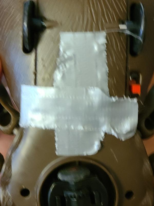 Taped battery compartment