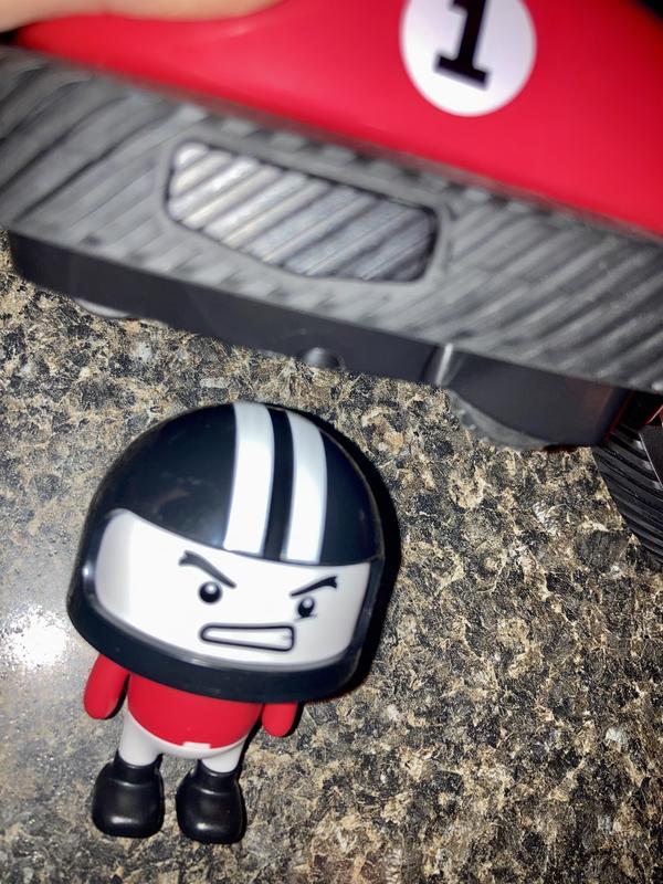 Button you hit on the side/ little guy pops out