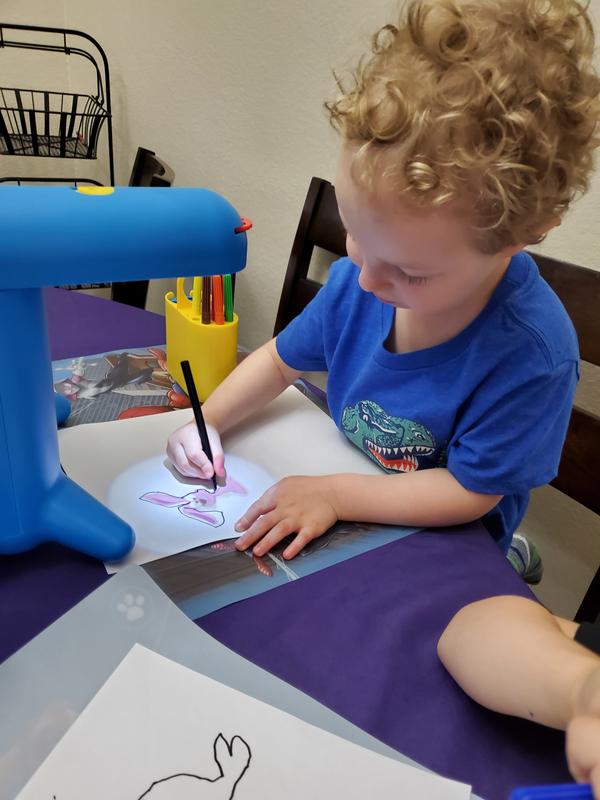 Middle son having a blast tracing!