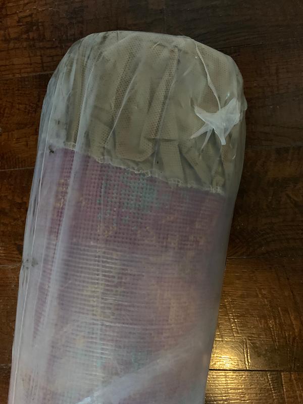 Top and bottom of the rolled rug safe with a thick plastic wrapping as well as a cover to avoid any tears or issues during shipping. Protects the edges!