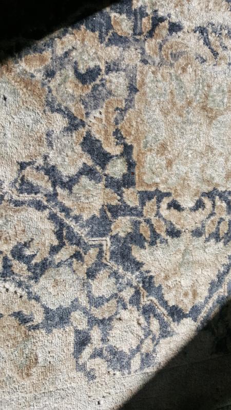 Another view of the field colors.The blue changes a bit with the sunlight and is somehwere between an antiqued navy and Benjamin Moore's Newburyport Blue HC155 in our room.