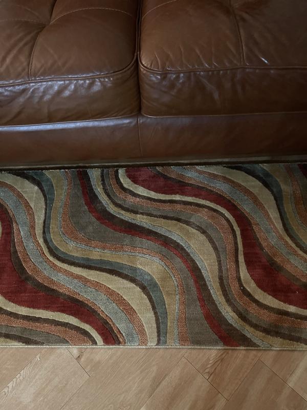 Colors work with sofa and flooring! We love the pattern, as well. Everything flows nicely!