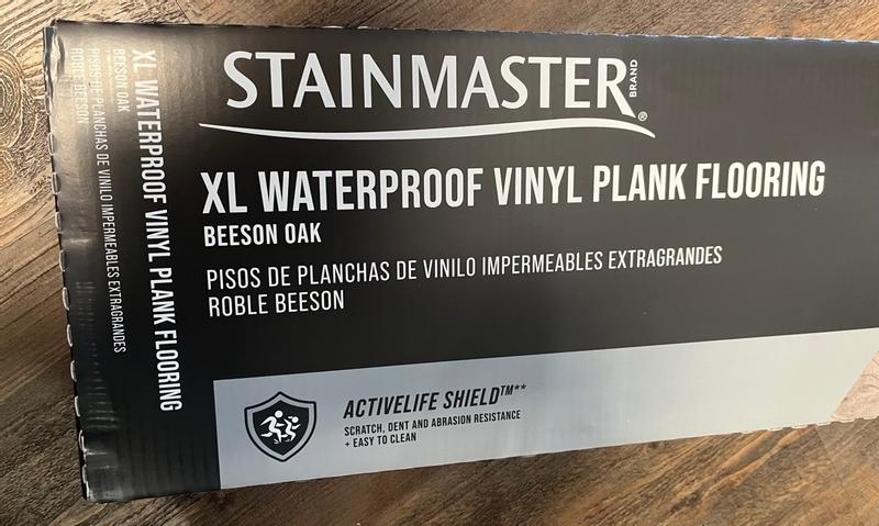 STAINMASTER (Sample) Beeson Oak Waterproof Wood Look Interlocking Luxury Vinyl Plank