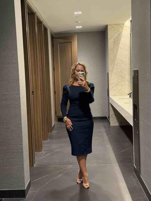 Customer photo for "Great dress but size up"