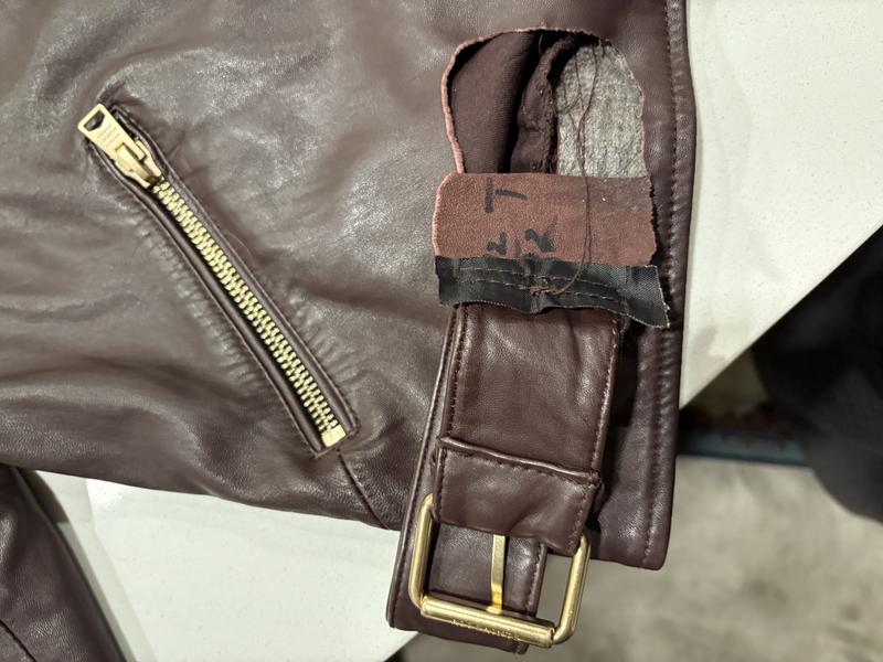 Flawed Design: Heavy Buckle Rips Soft Leather