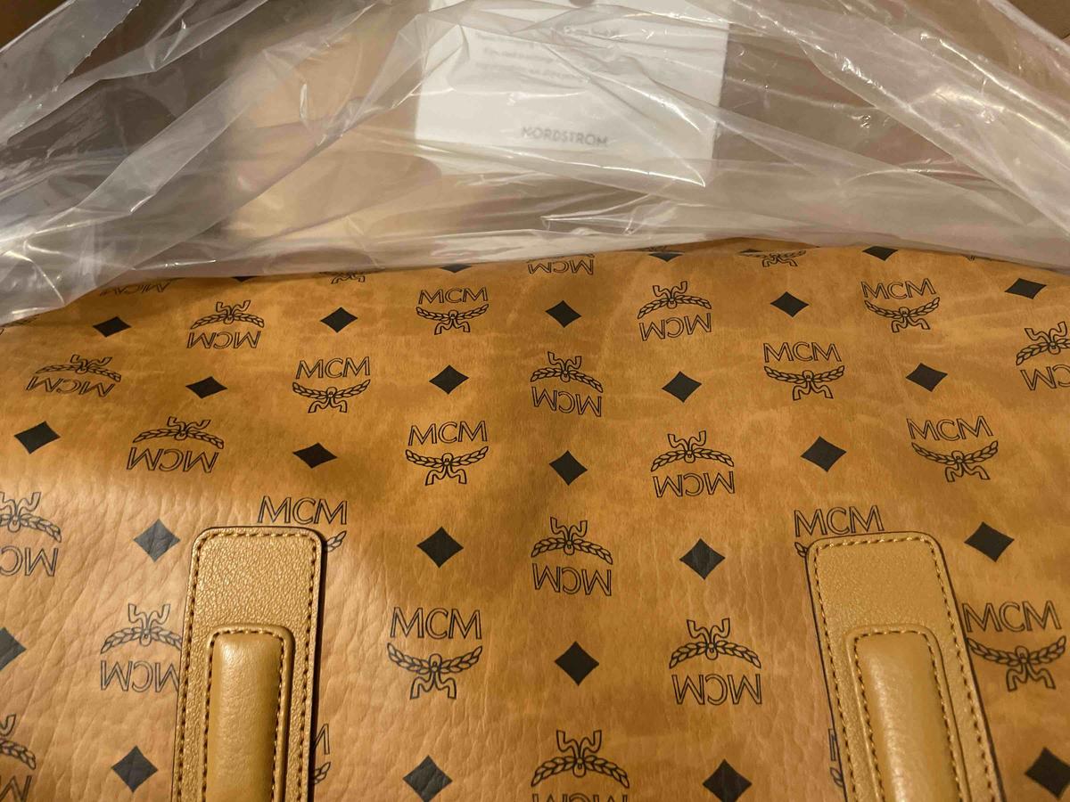 Customer photo for "Large MCM -terrible looks like plastic"