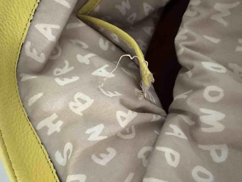 Customer photo for "Pretty bag, poorly made"