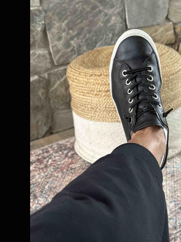 Customer photo for "my favorite travel and kick around shoe"
