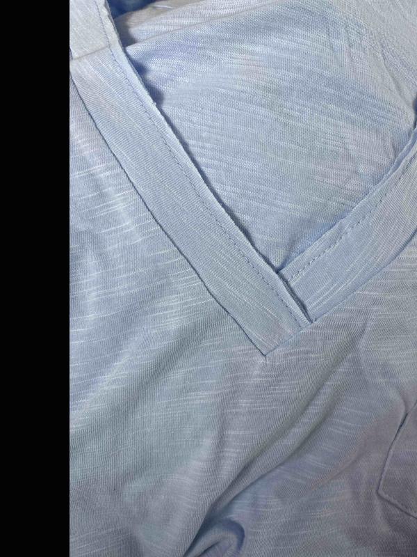 Customer photo for "v neck is raw edge"