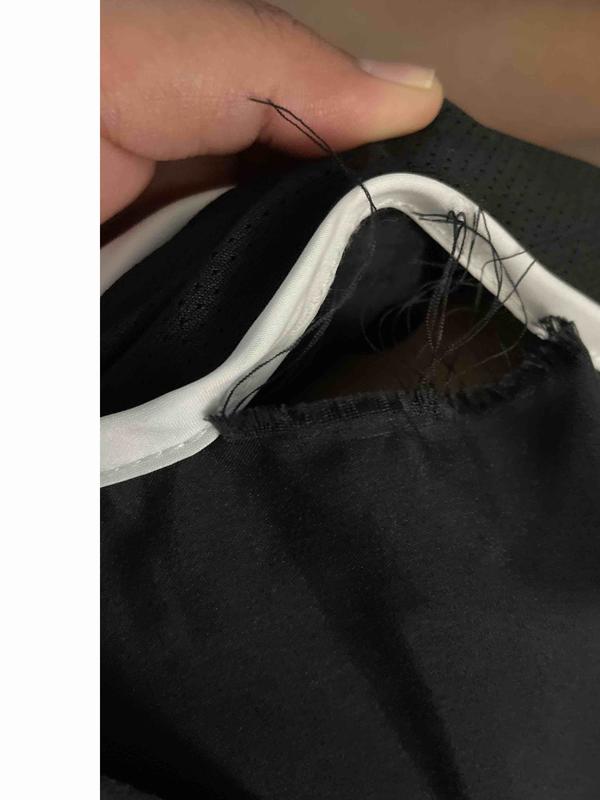 Customer photo for "big hole on the left side seam"