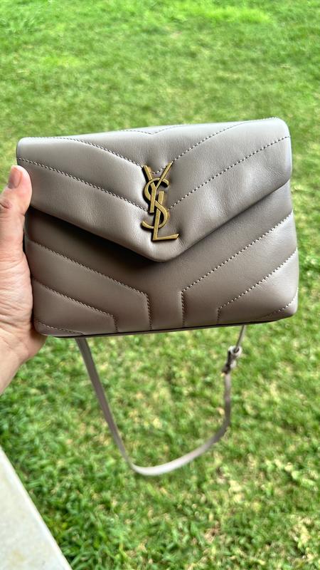 Customer photo for "Nice bag it fit my 14 pro max I love the color"