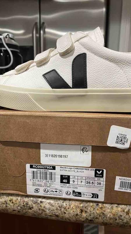 Customer photo for "Weird fit and the strap is short"