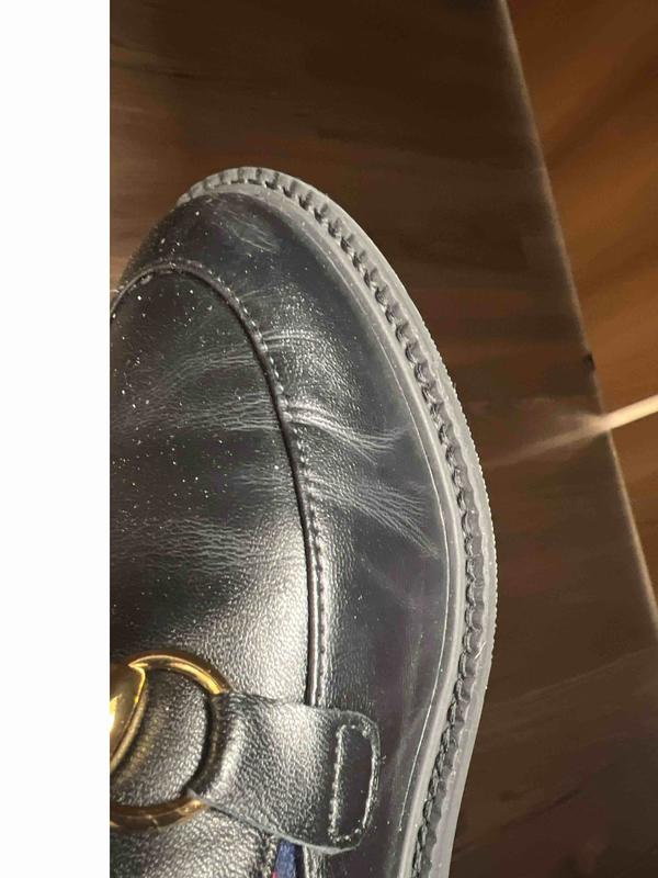 Customer photo for "good shoe but soles are not rubber"