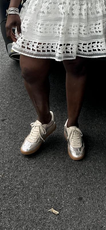 Love these sneakers. True to size.Walked all nigh