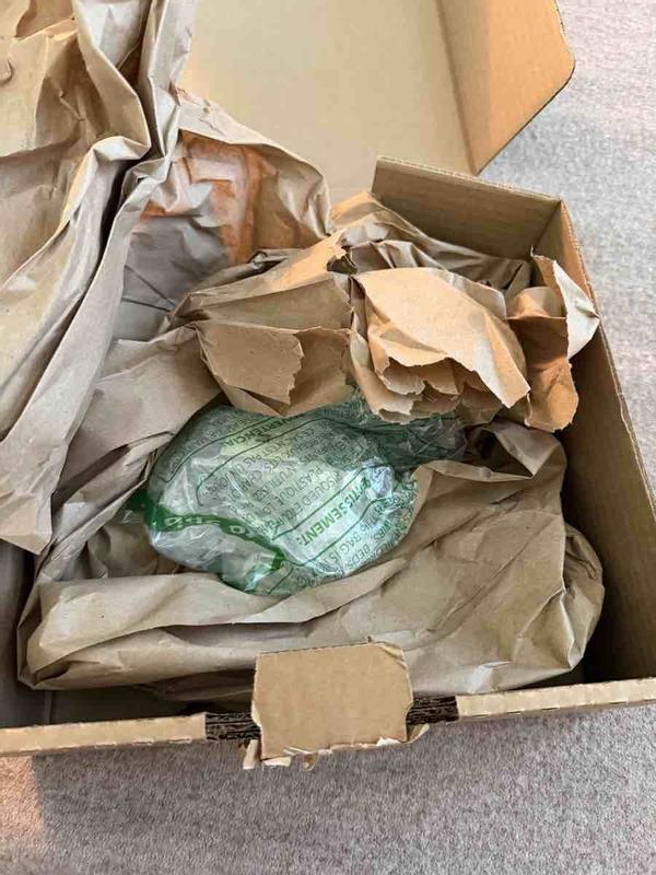 Customer photo for "Perfume smell amazing, but packaging awful"