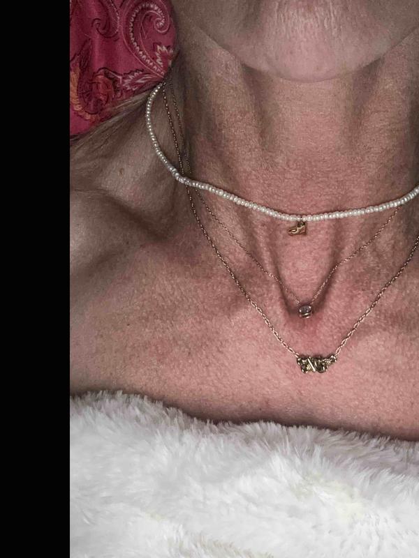 Customer photo for "stunning pearl with gold heart"