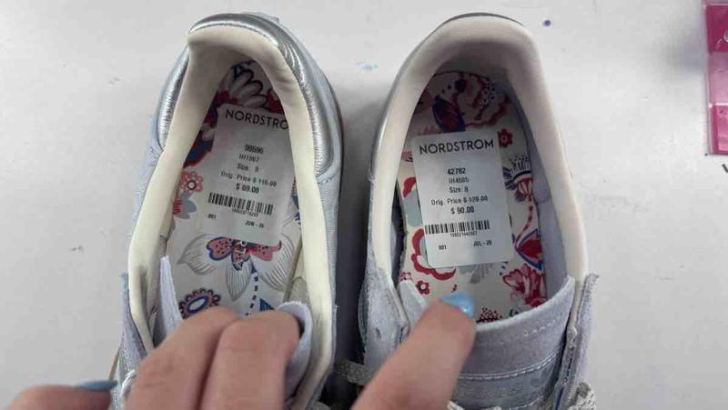 Customer photo for "Recieved 2 Different Shoes"