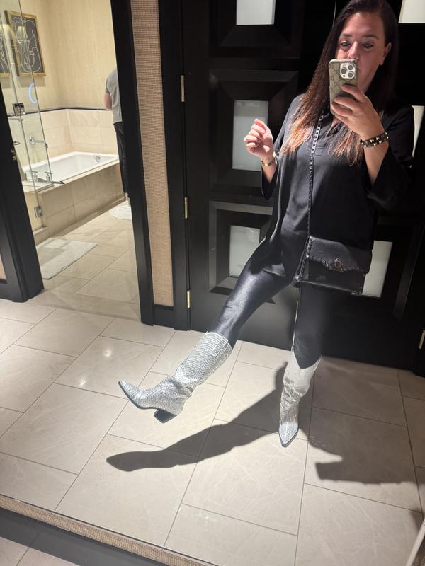 Customer photo for "Sparkling cowboy boots."