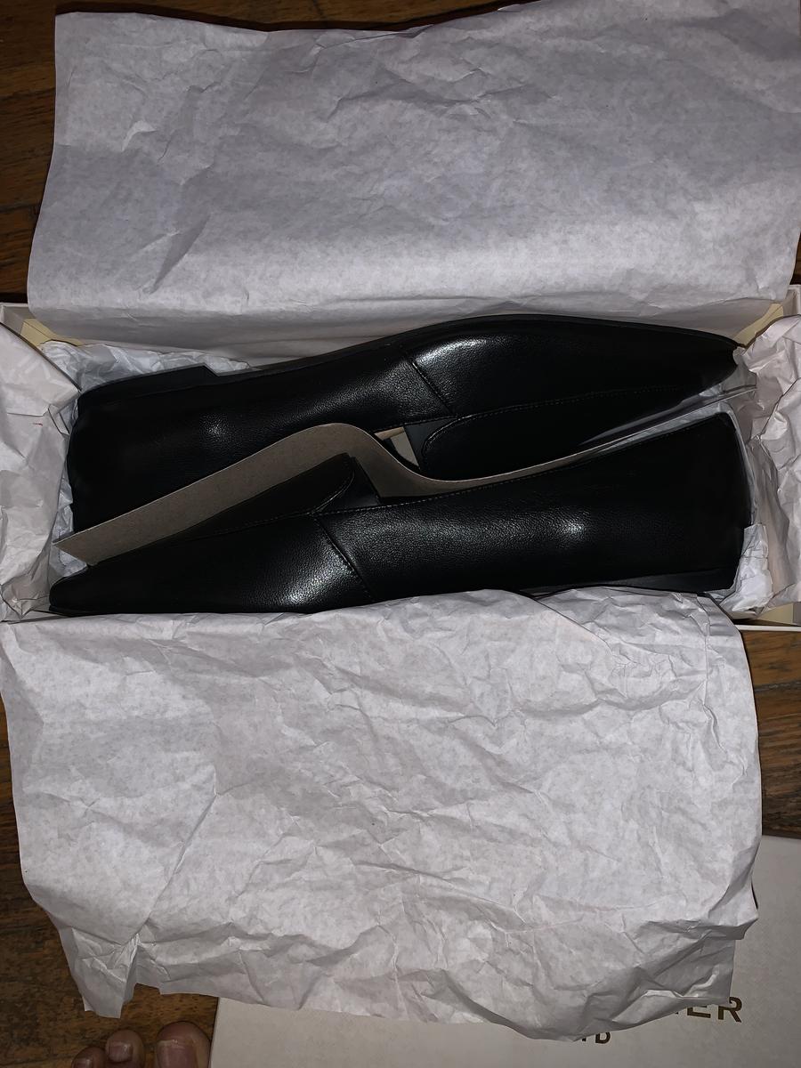Customer photo for "Long shipping. Great Shoe. Fits slightly large"