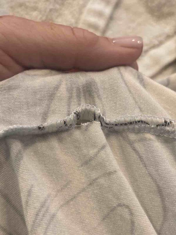 Customer photo for "pretty but sewn cheaply"