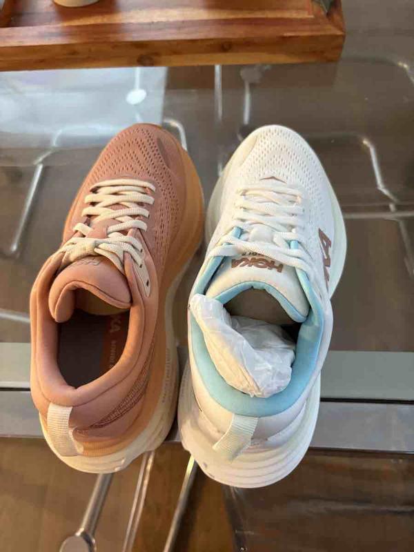 Customer photo for "received 2 shoes in different colors"