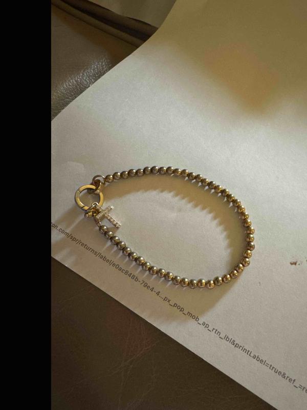 Customer photo for "Tarnishesd after 2 weeks"