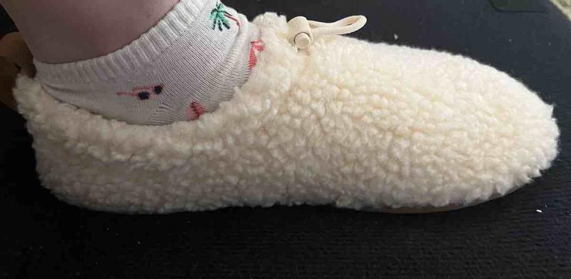 Customer photo for "comfy house slippers on steroids"