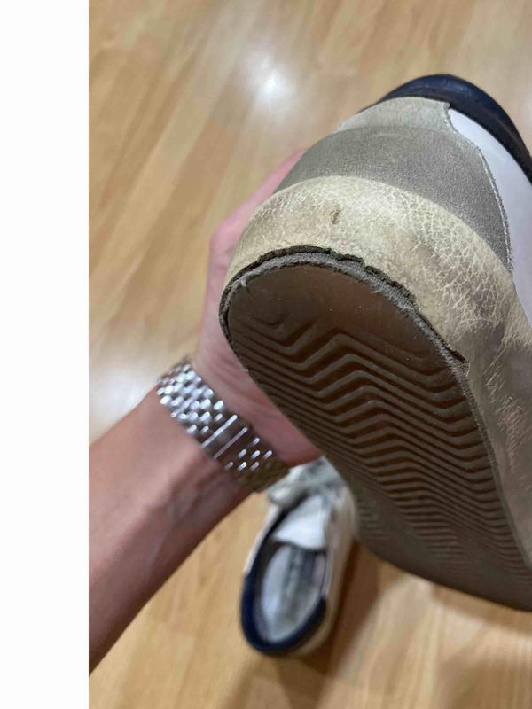 Customer photo for "dole started to crack after one year of wearing"