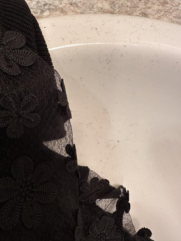 Customer photo for "Laces on the sleeves are a little bit hard"