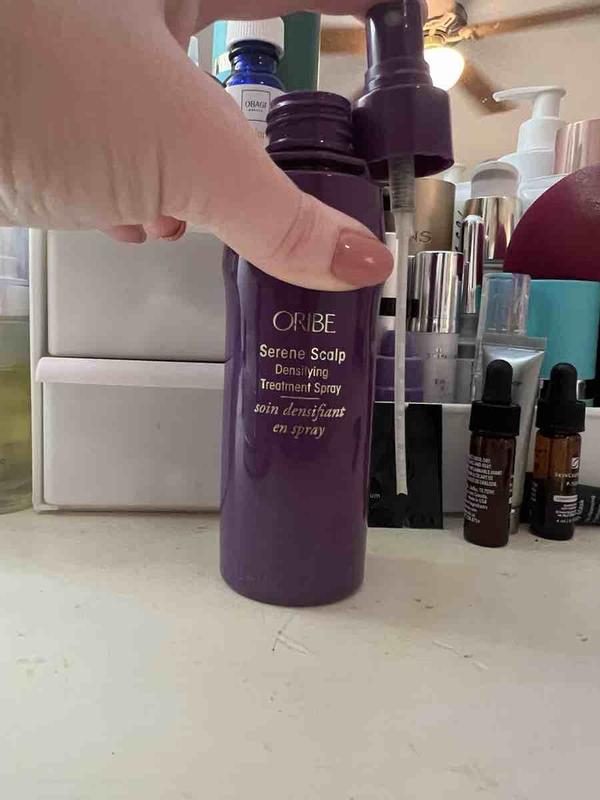 Customer photo for "The spray tube only reaches 2/3 of the bottle"