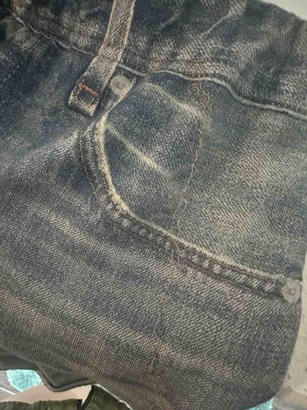 Customer photo for "stutching is coming undone"