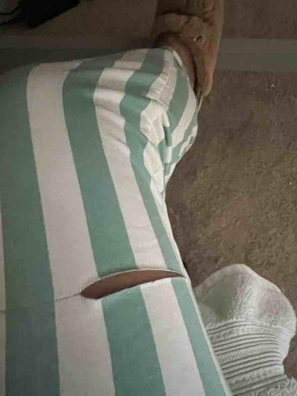 Customer photo for "I received ripped pants"