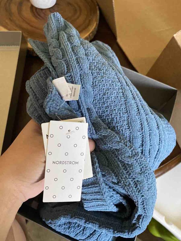 Customer photo for "cable knit blue baby blanket"